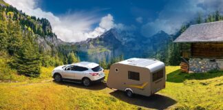 car and caravan in nature